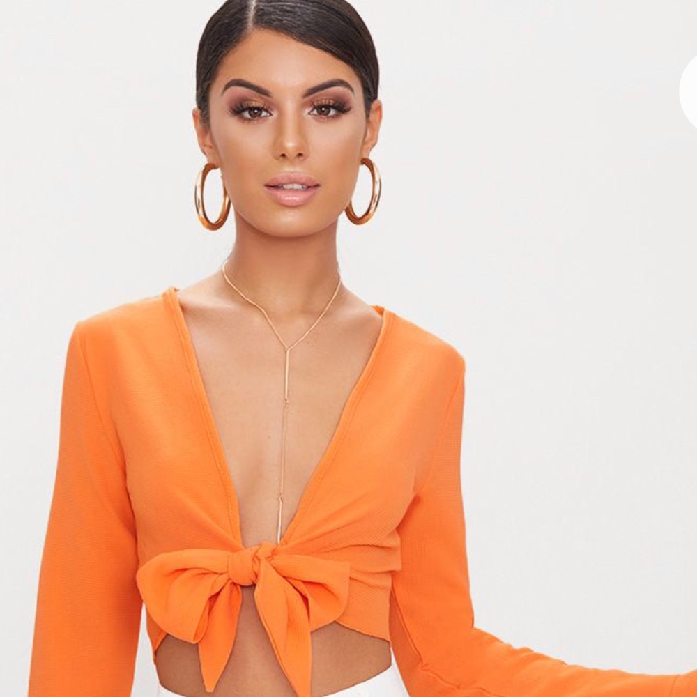 Frill sleeve blouse. No stretch. Fits small.